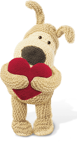 Boofle cuddling a red heart