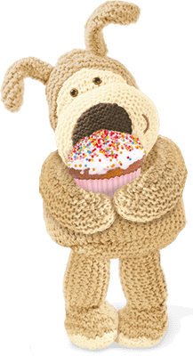 Boofle holding a birthday cupcake